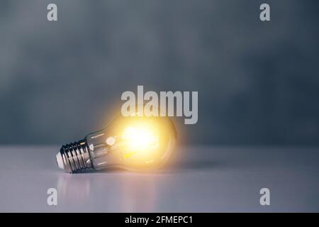 Light bulb with symbol of idea and inspiration, lightbulb with thinking and imagination efficient for success, solution and invention, bright of incan Stock Photo