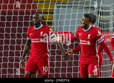 Liverpool. 8th May, 2021. Liverpool's Sadio Mane (L) celebrates scoring during the Premier League match between Liverpool and Southampton at Anfield in Liverpool, Britain, May 8, 2021. Credit: Xinhua/Alamy Live News Stock Photo