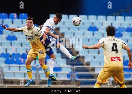 (210509) -- ZARAGOZA, May 9, 2021 (Xinhua) -- RCD Espanyol's Adria Pedrosa (L) vies with Zaragoza's Juan Narvaez during a Spanish second division league football match between Real Zaragoza and RCD Espanyol in Zaragoza, Spain, May 8, 2021. (La Liga/handout via Xinhua) Stock Photo