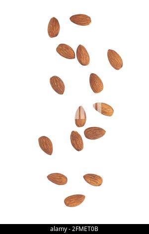 Almonds falling isolated on white background with clipping path. Stock Photo