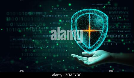 Antivirus shield icon on hand of businessman using Cyber Security Privacy or Information Privacy to block a cyber attack. Network security system. Stock Photo