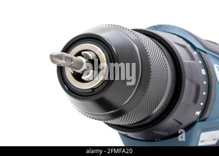 Cordless drill with drill bit working also as screw gun. Isolated on white Stock Photo