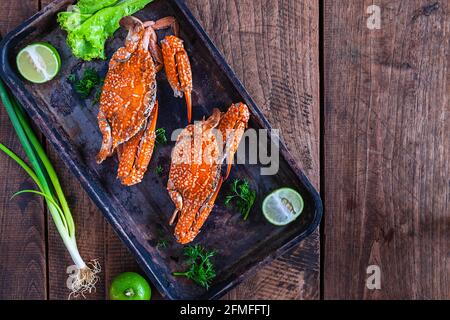 Cooked crabs Seafood in Plate on the table Stock Photo