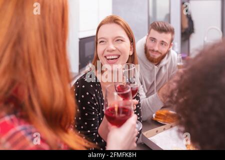Festive party among multi-ethnic friends at home Stock Photo