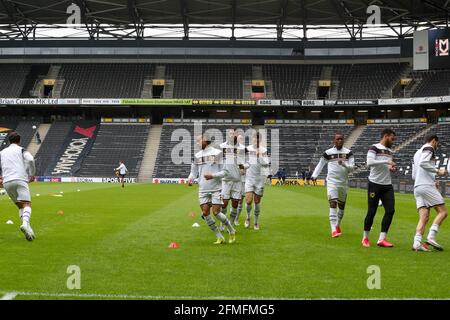 MILTON KEYNES, UK. MAY 9TH Milton Keynes Dons players warm up before the Sky Bet League One match between MK Dons and Rochdale at Stadium MK, Milton Keynes on Sunday 9th May 2021. (Credit: John Cripps | MI News) Credit: MI News & Sport /Alamy Live News Stock Photo