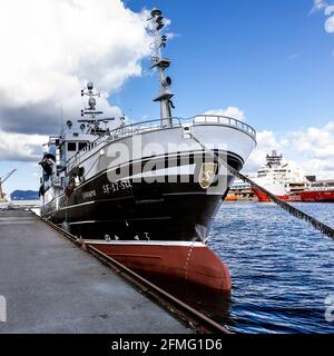 Old fishing vessel Sjarmor (Sjarmør, built 1993) moored at Damsgaardsundet, in the port of Bergen, Norway. Stock Photo