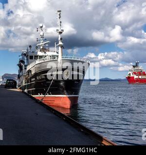 Old fishing vessel Sjarmor (Sjarmør, built 1993) moored at Damsgaardsundet, in the port of Bergen, Norway. Stock Photo