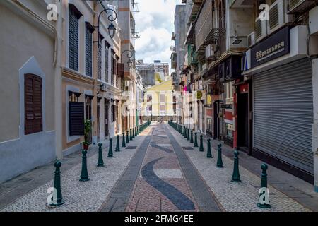 Macao, China - April 2, 2020: View to the urban street with short buildings at the sides in macao Stock Photo