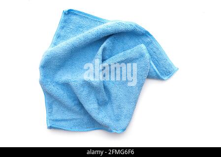 Blue kitchen rug isolated on white. Crumpled used micrifibre cloth clean, top view. Stock Photo
