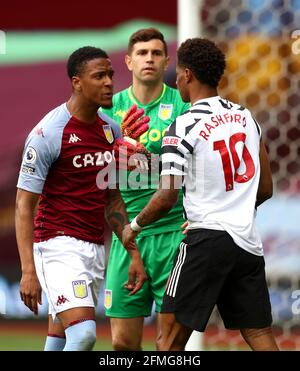 Tempers flare between Aston Villa's Ezri Konsa (left) and Manchester United's Marcus Rashford during the Premier League match at Villa Park, Birmingham. Picture date: Sunday May 9, 2021. Stock Photo
