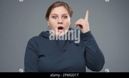 Photo of the stout woman with great idea, closeup Stock Photo