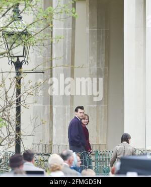 Brighton UK 9th May 2021 - Harry Styles and Emma Corrin filming a scene for the film 'My Policeman' in Brighton's Royal Pavilion Gardens today . The film which is set in the 1950s is being shot around the city at various locations over the next couple of weeks : Credit Simon Dack / Alamy Live News Stock Photo