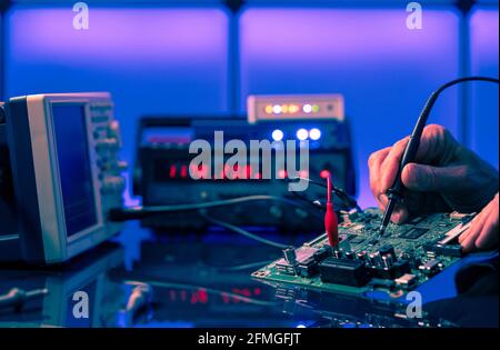 PCB witch microcontroller in electronics laboratory Stock Photo