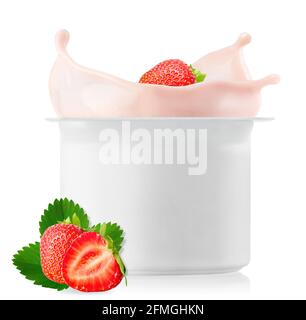 strawberry falling in plastic cup with yogurt Stock Photo