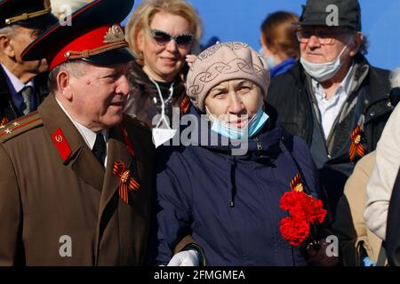 St. Petersburg, Russia. 09th May, 2021. Residents of besieged Leningrad and veterans of the Great Patriotic War during the parade.A solemn military parade in St. Petersburg to mark the 76th anniversary of the Victory in the Great Patriotic War. Credit: SOPA Images Limited/Alamy Live News Stock Photo
