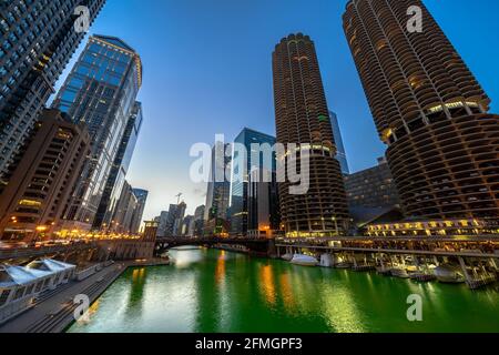 The Chicago riverwalk cityscape river side at the twilight time, USA downtown skyline, Architecture and building with tourist concept Stock Photo