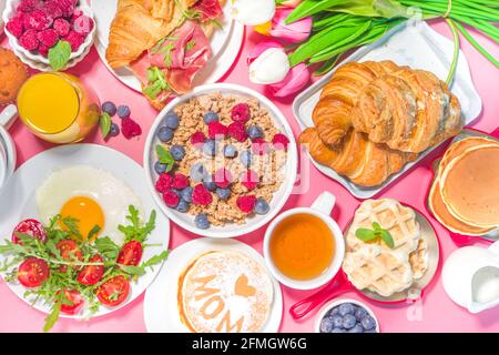 Mothers day Brunch restaurant invitation concept. Various Moms Womans Day Menu background, with traditional breakfast and lunch food and drink set, wi Stock Photo