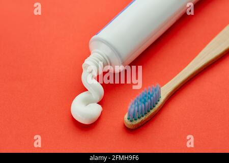 Oral care products, red background, nobody Stock Photo