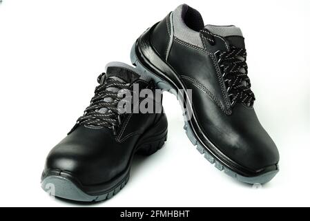 Black leather work safety boots isolated on white Stock Photo