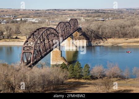 The historic 1882 Northern Pacific Railroad Bridge infrastructure now the BNSF Railway Bridge over the Missouri River between Bismarck and Mandan, ND Stock Photo