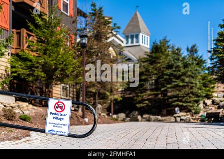 Snowshoe, USA - October 6, 2020: Pedestrian area zone village, no car prohibited with no unauthorized vehicles and lodge buildings in background at We Stock Photo