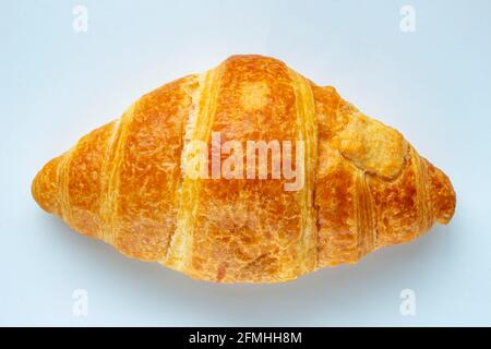 A Croissant on a white background. Stock Photo