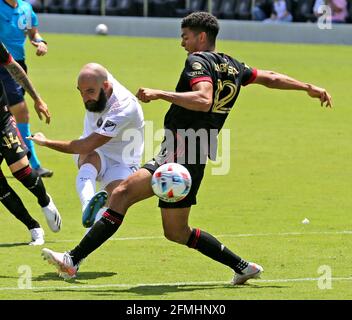 Miami, USA. 09th May, 2021. Inter Miami's Gonzalo Higuain (9) attempts to score around Atlanta United's Miles Robinson (12) in the second half at DRV Pink Stadium in Fort Lauderdale, Florida, Sunday, May 9, 2021. (Photo by Charles Trainor Jr./Miami Herald/TNS/Sipa USA) Credit: Sipa USA/Alamy Live News Stock Photo