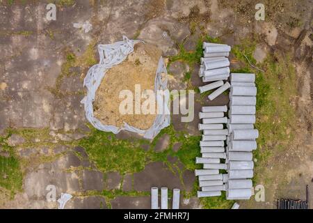 Concrete pipes to construct drainage systems on large cement drainage pipes for industrial building construction, selective focus. Stock Photo