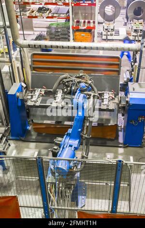 Welding robot in the process. Modern welding production. Stock Photo