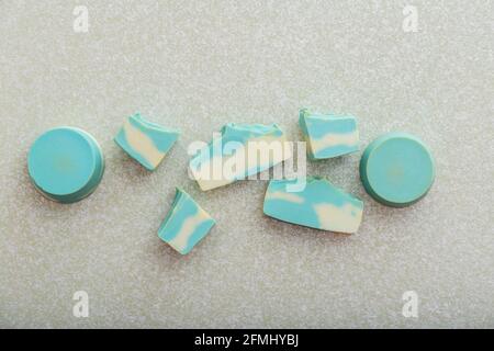 Blue mint natural handmade soap and solid shampoo bar of different shapes composition on light background. Flat lay Aromatherapy soap bath beauty Stock Photo