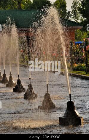 Central channel with fountains, Shalimar Bagh, a Moghul Garden on the banks of Dal Lake, Srinagar, Jammu & Kashmir, India Stock Photo