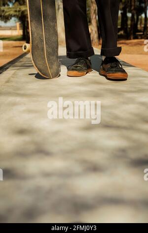 Close up of the feet of a young skateboarder Stock Photo