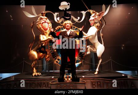 PY GERBEAU DOME CHIEF EXECUTIVE  JULY 2000 IN FRONT OF A GERALD SCARFE SCULPTURE OF AN ALTERNATIVE BRITISH CREST, INCORPERATING THE QUEEN AND TONY BLAIR. GERBEAU WAS LAUNCHING THE NEW SUMMER ADVERTISING CAMPAIGN, 'YOU'VE GOT A MIND OF YOUR OWN, USE IT AT THE DOME. Stock Photo