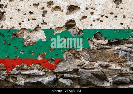 Concept of the Political Situation in Bulgaria a damaged painted flag on a cracked wall with wholes. 3D-Illustration. 3D-rendering Stock Photo
