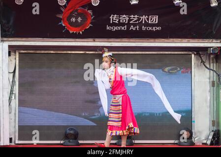 One of the students performing at the school for the community in Lixian, Hebei, China. Stock Photo