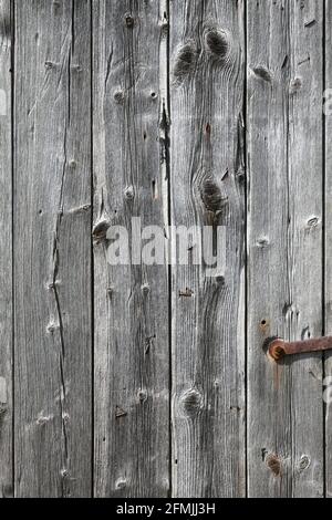 Picture of an old rough wooden board wall. Stock Photo
