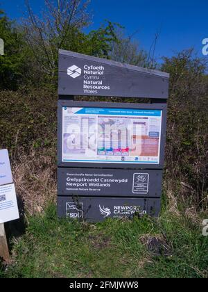 Information board showing map and details of Newport Wetlands National Nature Reserve owned by Natural Resources Wales Nash South Wales UK Stock Photo