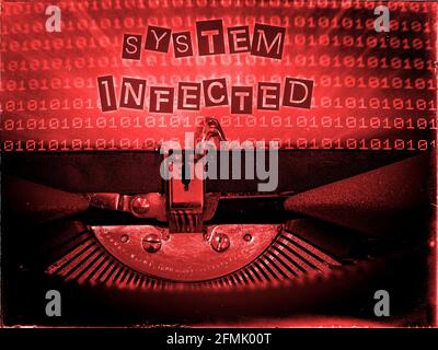 System Infected, Mechanical Typewriter, Binary code background, Red tone, Vintage distorted look, Ransom note typography Stock Photo