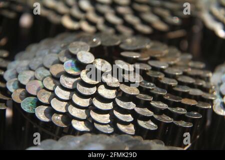 Stainless steel roofing coil nails, wire collated Stock Photo