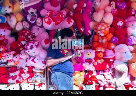 Display of children toy shop in the local market, I captured this image from Chalk Bazar, Dhaka, Bangladesh, Asia Stock Photo