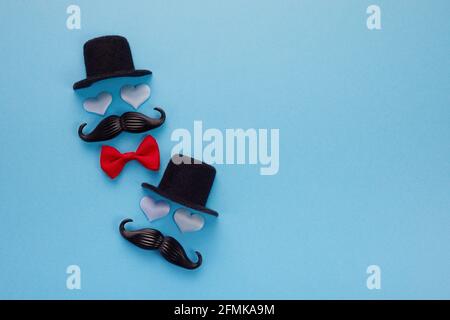 Happy Father's Day greeting card with decoration. Includes mustache, hat and hearts. Stock Photo