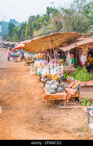 Squash for sale in a typical local roadside food market stall in Pong Song, Ban Keng Kang, a village near Vang Vieng, Vientiane Province, Laos Stock Photo