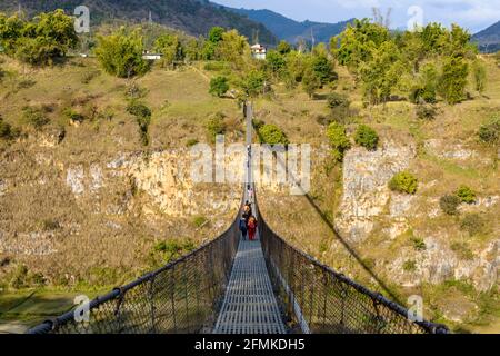 Suspension bridge over the Bhalam river in Pokhara, Nepal Stock Photo