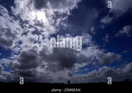 Clouds gather over the 17th century Pistone Windmill near Alyesbury. Picture date: Monday May 10, 2021. Stock Photo