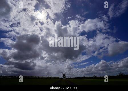 Clouds gather over the 17th century Pistone Windmill near Alyesbury. Picture date: Monday May 10, 2021. Stock Photo