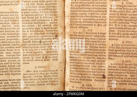 Old book pages with latin writings and mold texture background Stock Photo