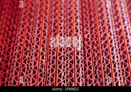 Closeup Texture of Unfold Red colored Corrugated Paper Boxes Stack Stock Photo