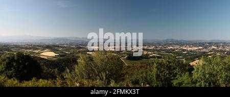 Panoramic summer view of Tuscan landscape. Volterra suburbs. Italy. Stock Photo