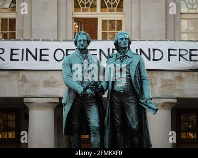 Closeup view of sculpture monument statue of Johann Wolfgang Goethe and Friedrich Schiller in front of German National Theatre in Weimar Thuringia Ger Stock Photo
