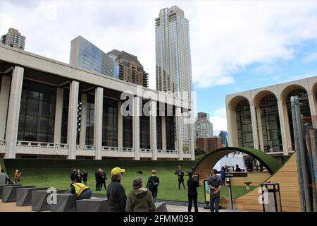 New York, NY. USA. 10th May, 2021 - NYC Opens Green Space at Lincoln Center to help with Pandemic Recovery. The Green at Lincoln Center is part of Governor Andrew Cuomo restart stage the green will be holding live music, family activates and much more as pandemic restriction are lifted. Credit Mark Apollo/Alamy Livenews Stock Photo